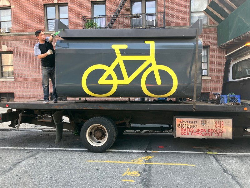 One and done: An Oonee mini being removed from Astoria after this year's successful test.