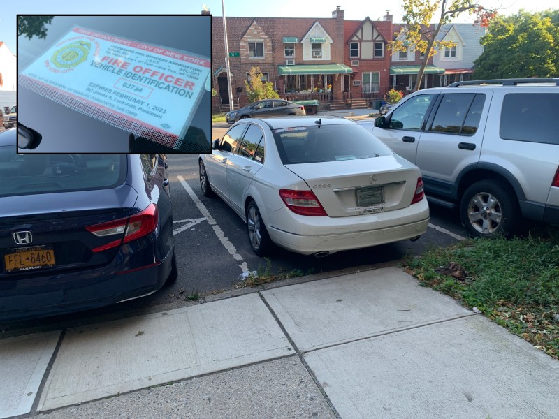 Both 311 calls were accurate: The abandoned car was there, and the car next to it had an abused FDNY placard.